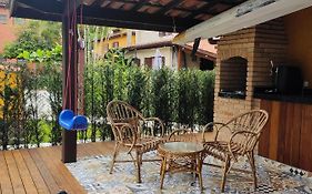 Linda casa de condomínio em Boiçucanga